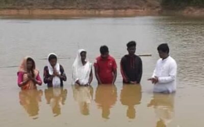 Baptisms in a region of the Third World where the government has ruled it to be ILLEGAL