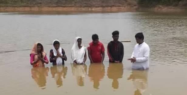 Baptisms in a region of the Third World where the government has ruled it to be ILLEGAL